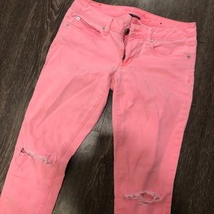 AE neon skinny jeans